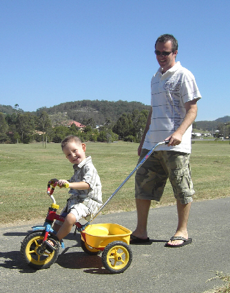 PushmeHome attachment for toddlers trike